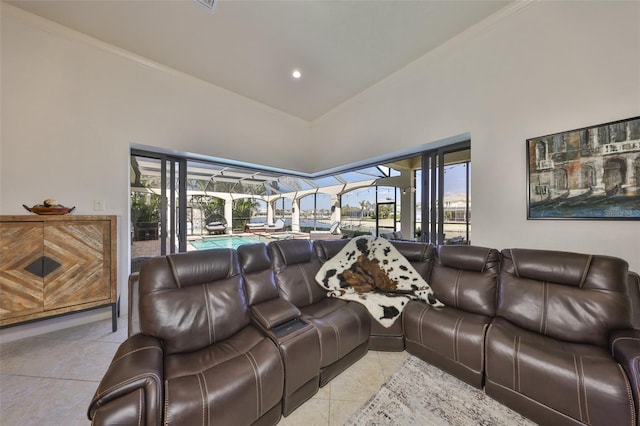 living room with lofted ceiling, a sunroom, light tile patterned floors, and recessed lighting