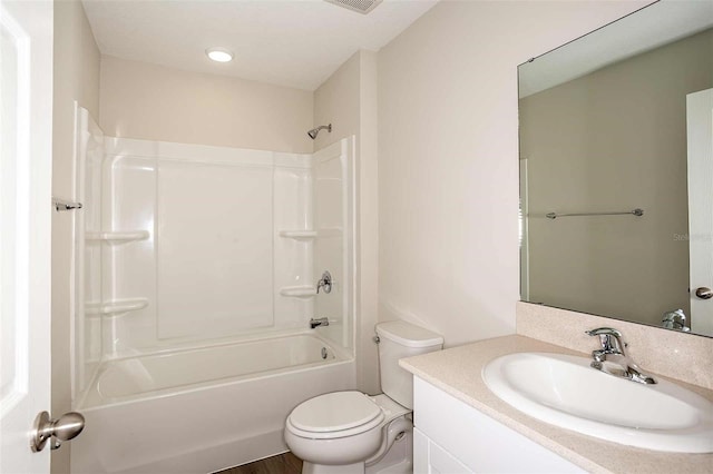 full bathroom featuring vanity, toilet, shower / tub combination, and wood-type flooring