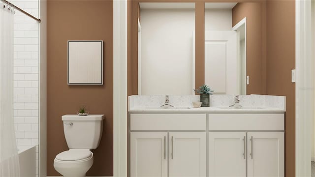 full bathroom featuring vanity, toilet, and tiled shower / bath combo