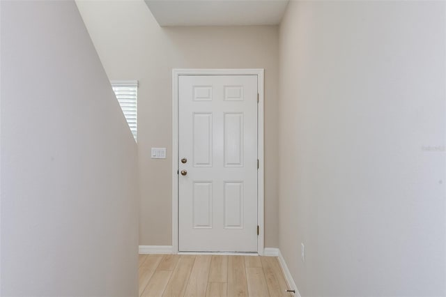 doorway featuring light hardwood / wood-style floors