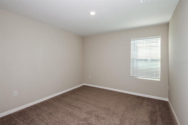 spare room with carpet flooring