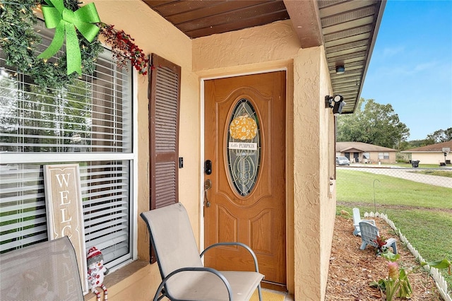 1375 6 Iron Dr, Lakeland, FL 33801 - property entrance featuring stucco siding