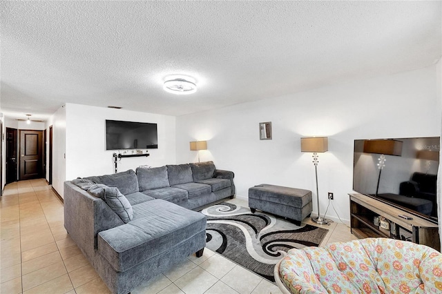 tiled living room with a textured ceiling