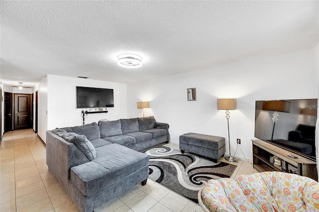 1375 6 Iron Dr, Lakeland, FL 33801 - living room with light tile patterned floors and a textured ceiling