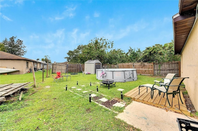 1375 6 Iron Dr, Lakeland, FL 33801 - view of yard featuring a deck