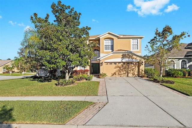 view of front of house featuring a garage and a front lawn