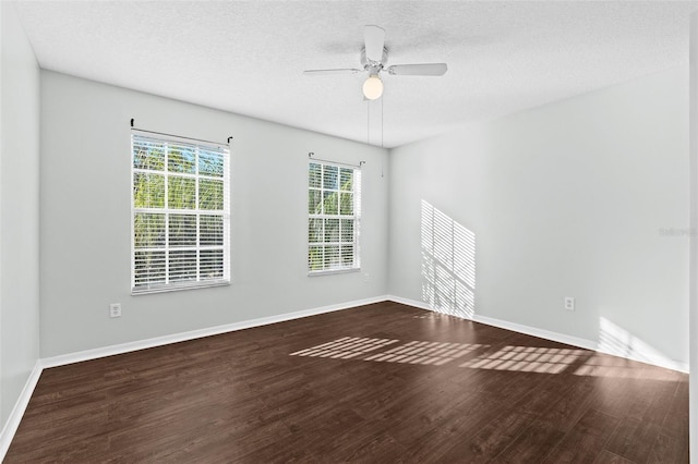 unfurnished room featuring a textured ceiling, hardwood / wood-style flooring, and ceiling fan