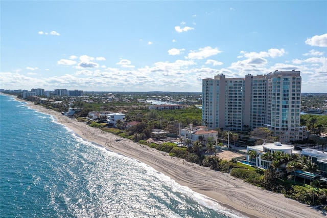 bird's eye view featuring a view of the beach and a water view