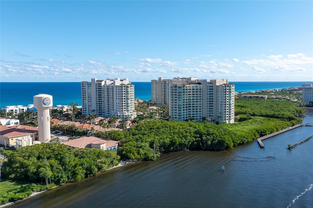 birds eye view of property featuring a water view