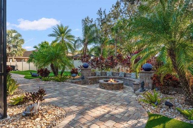 view of patio / terrace with a fire pit