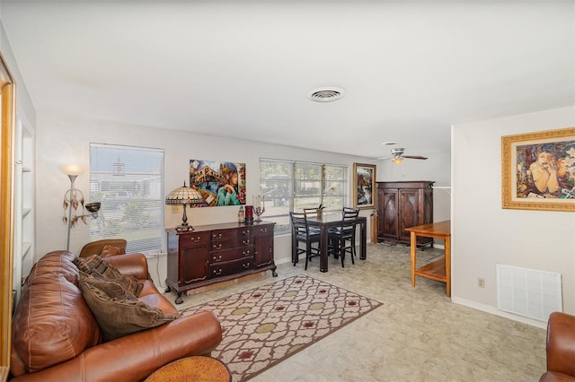 living room featuring ceiling fan