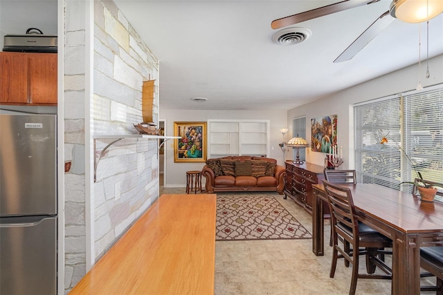 living room featuring ceiling fan