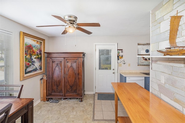 kitchen featuring dishwasher, light tile patterned floors, and ceiling fan