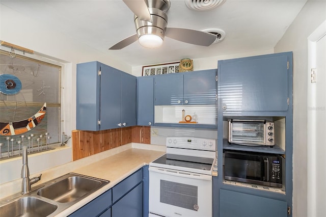 kitchen with ceiling fan, sink, white electric range, and blue cabinetry