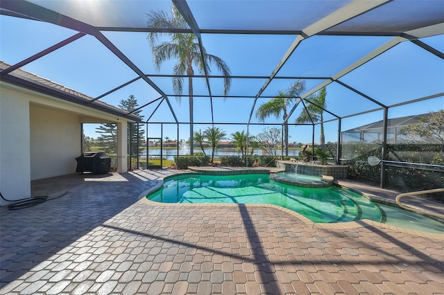 view of swimming pool featuring a water view, a lanai, a patio, and an in ground hot tub