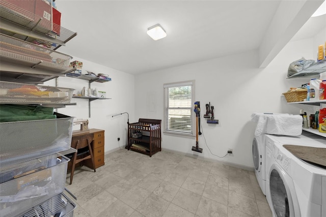 laundry area with washing machine and dryer