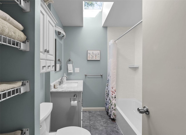 full bathroom with vanity, a skylight, toilet, and shower / bathtub combination with curtain