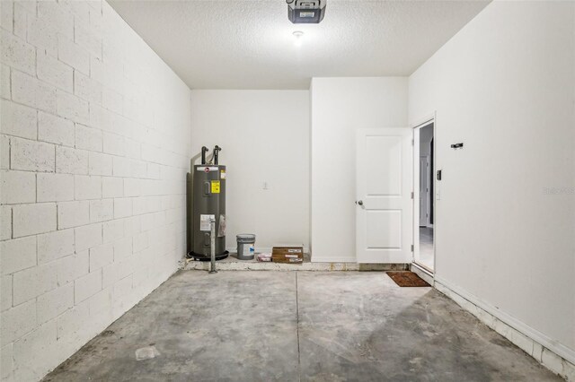 garage featuring water heater