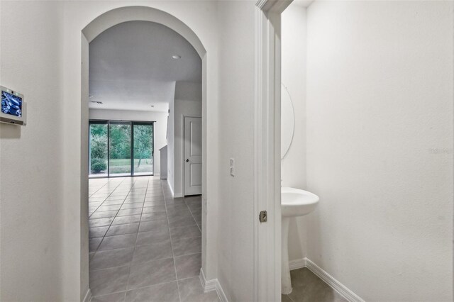 corridor featuring tile patterned floors