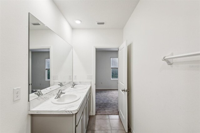 bathroom with vanity and tile patterned floors