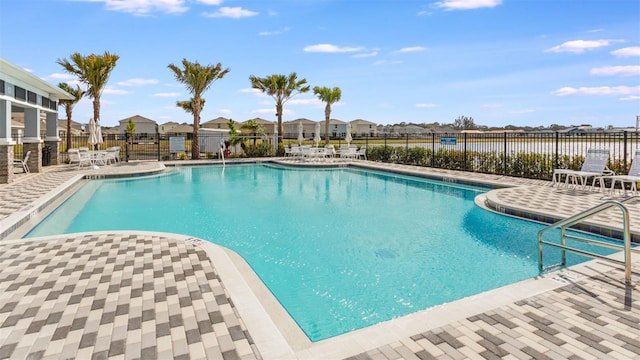 view of swimming pool with a patio area