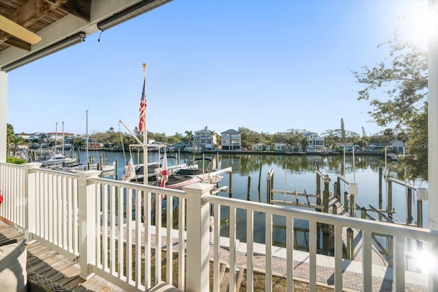 dock area with a water view