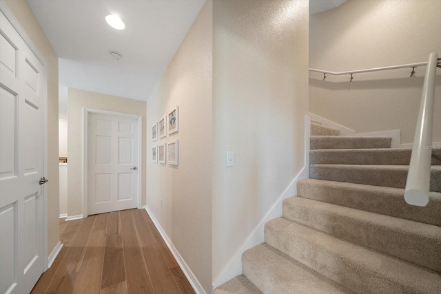 hallway featuring hardwood / wood-style floors