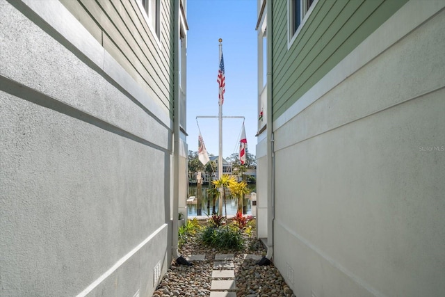 view of side of property with a water view