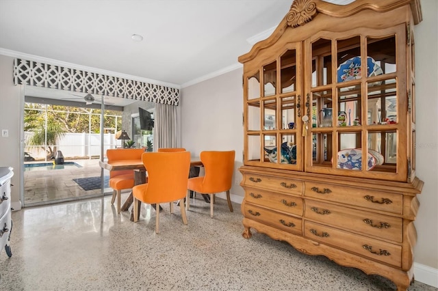 dining room featuring ornamental molding