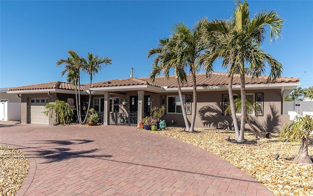 view of front of property featuring a garage