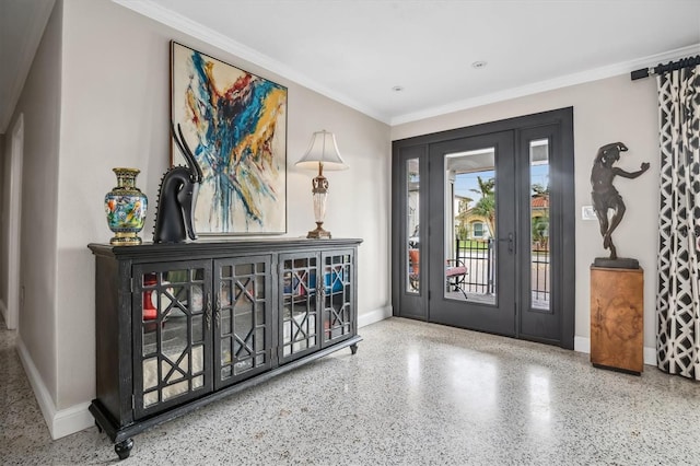 foyer featuring ornamental molding