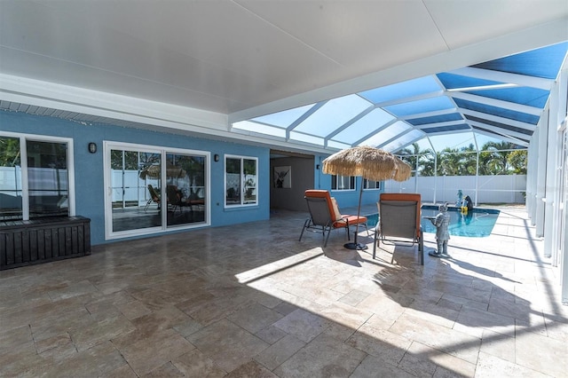 view of patio featuring a lanai and a fenced in pool