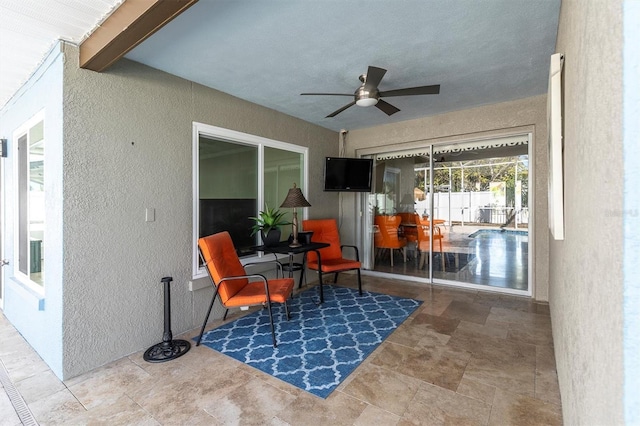 view of patio with ceiling fan