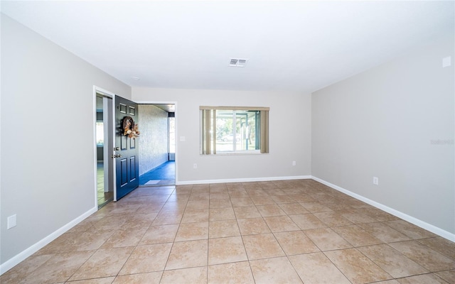 view of tiled empty room