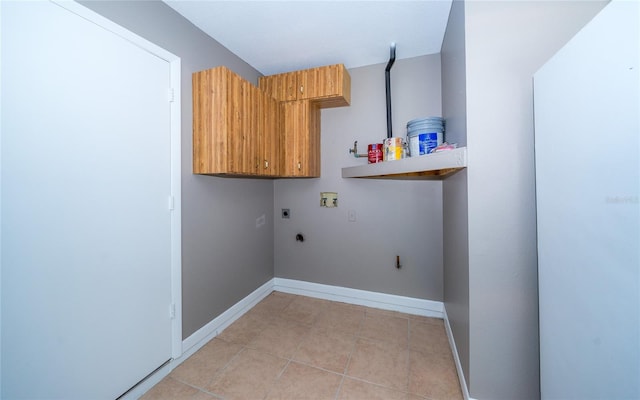 laundry area with hookup for a washing machine, light tile patterned floors, and electric dryer hookup