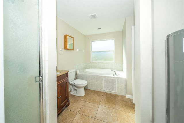 full bathroom featuring toilet, shower with separate bathtub, vanity, and tile patterned floors