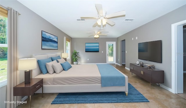 bedroom with access to exterior and ceiling fan