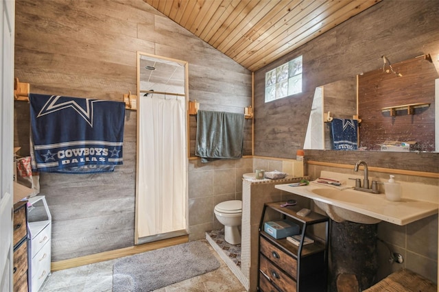 full bathroom featuring lofted ceiling, a shower with shower curtain, toilet, wooden walls, and wooden ceiling