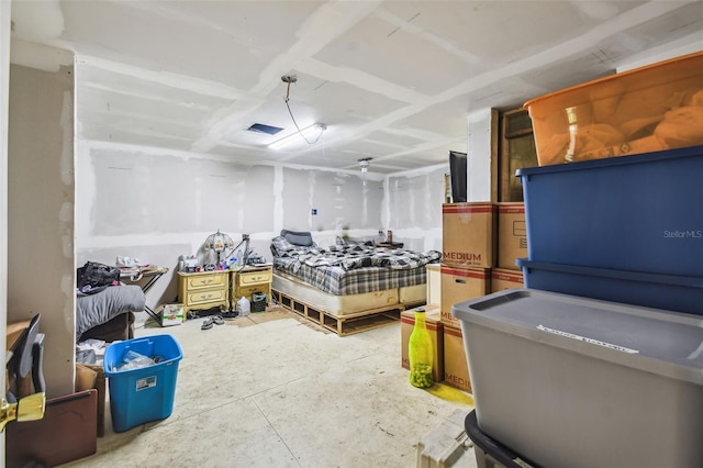 bedroom with unfinished concrete floors