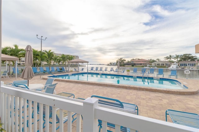 view of swimming pool featuring a gazebo and a patio area