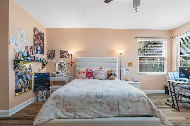 bedroom featuring wood-type flooring and ceiling fan