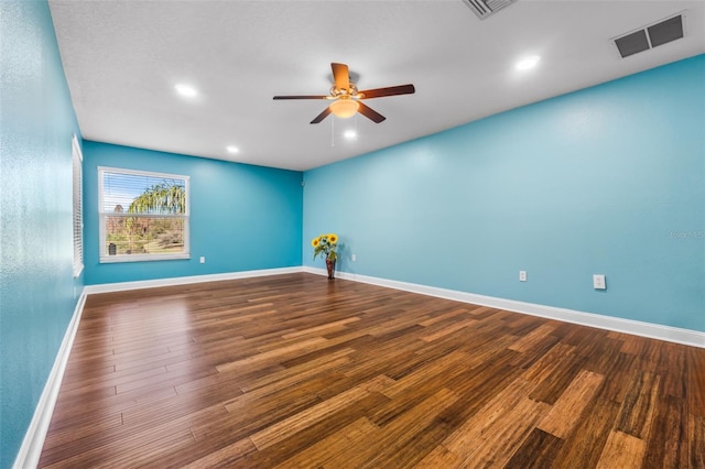 unfurnished room featuring hardwood / wood-style floors and ceiling fan