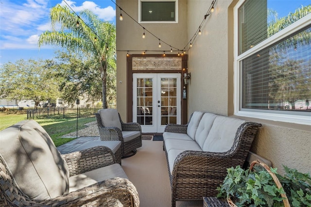 view of patio with an outdoor living space and french doors