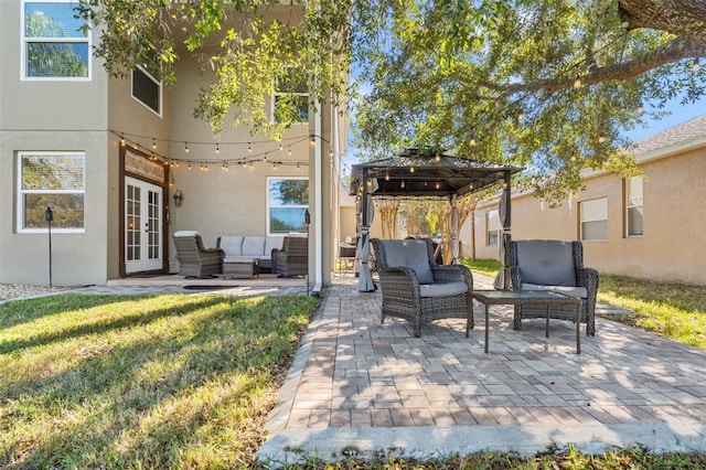 view of patio / terrace with a gazebo, an outdoor hangout area, and french doors