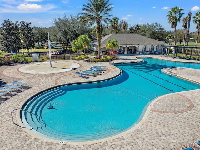 view of pool featuring a patio area