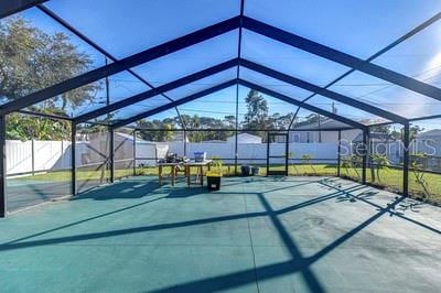 view of patio / terrace with a lanai