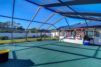 view of pool with a lanai