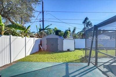 view of patio with a storage unit