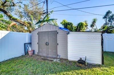 view of outdoor structure featuring a yard