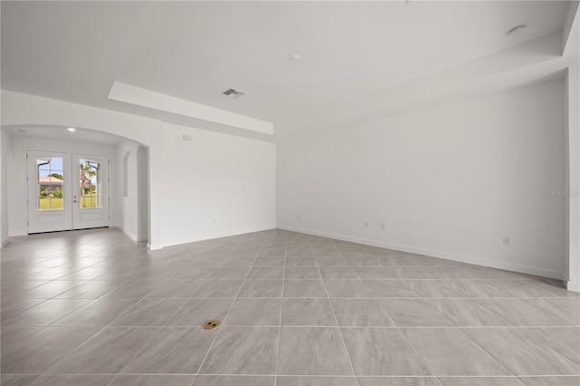 empty room with light tile patterned floors